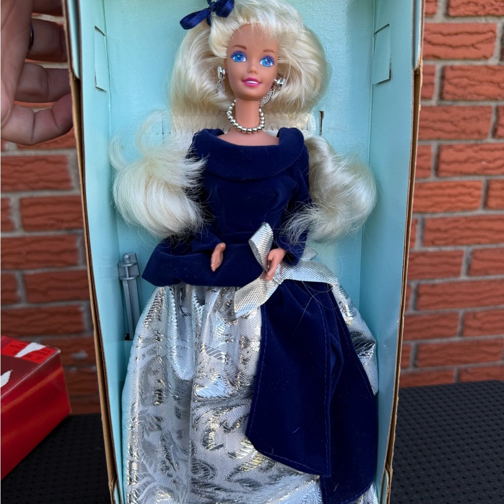 Elegant Blue and Silver Doll